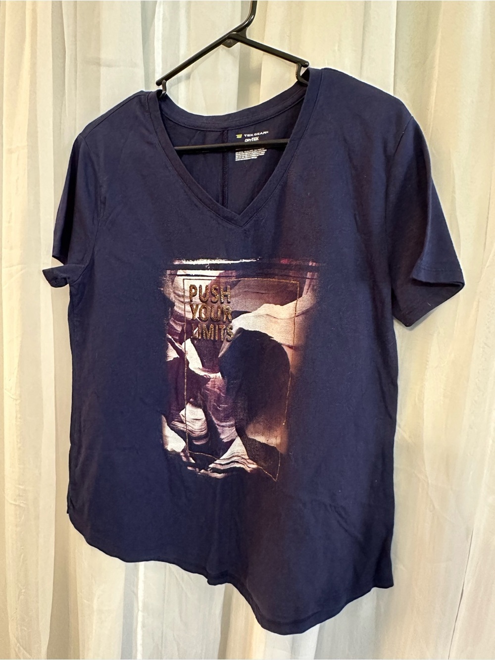 Tek Gear women’s navy v neck graphic t shirt with “Push Your Limit”